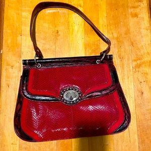 Red leather handbag